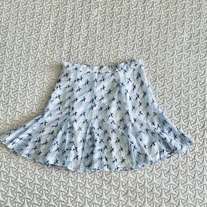 BEBE Ruffle Mini Starprint skirt Size XS